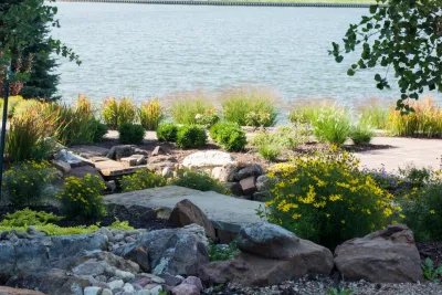 Rustic Mountain Stream into Lakeside Patio — Landscape Design project by Breaking Ground