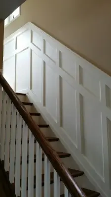 Staircase with Wainscot Paneling — Kitchen Remodeling project by Straight Edge Construction Group