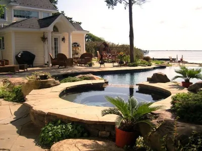 Massapequa Infinity Swimming Pool on the Bay — Landscape Construction project by Emil Kreye & Son Inc. in Massapequa