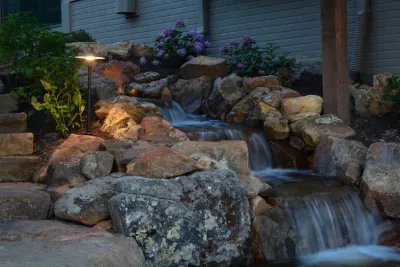 Lakeside Entertainment Space and Water Feature by Breaking Ground