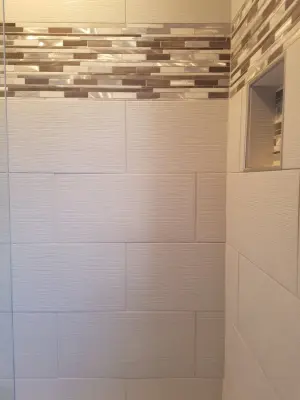Custom-Built Shower with White 12x24 Tiles — Kitchen Remodeling project by Paramount Tile Design