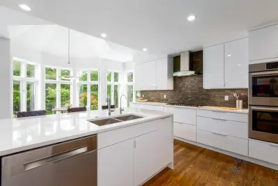 Glossy White Cabinets with White Countertop — Kitchen Remodeling project by Boss Design Center