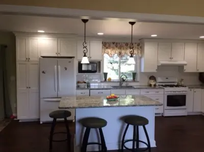 Classic White Kitchen Renovation — Kitchen Remodeling project by July's Quality Construction & Remodeling