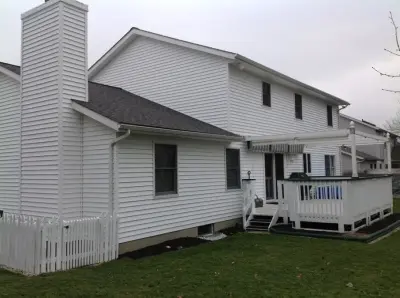 Crisp White Vinyl Siding — Kitchen Remodeling project by Medina Exteriors & Remodeling