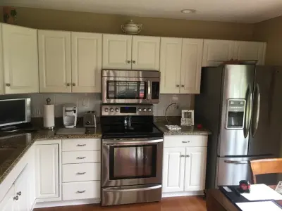 Williamsville - Classic Cream Kitchen — Kitchen Remodeling project by New York Kitchen & Bath