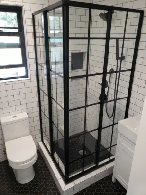 Kensington Restroom — Home Renovation & Remodeling Services project by Maison Construction And Renovations