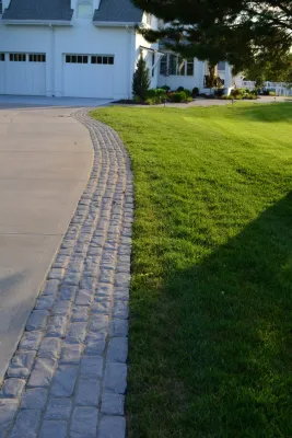 Bluestone Paver Entry — Landscape Design project by Breaking Ground in Gretna