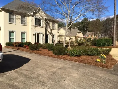 Pine Straw Installtion — Landscape Construction project by Fine Edge Landscapes