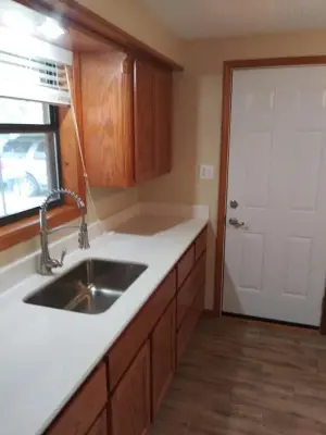 Kitchen Renovation and New Flooring Installation — Home Renovation & Remodeling Services project by Kaphar Construction