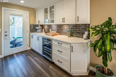 Stunning Dual-Hued Kitchen — Home Renovation & Remodeling Services project by Ovation Restoration