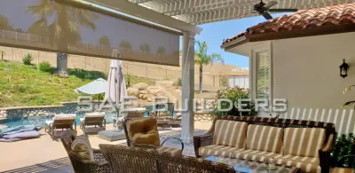 Alumawood Structure with Roll Down Drop Shades at La Cresta — Home Renovation & Remodeling Services project by SAE Builders
