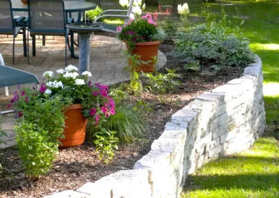 Stone Patio and Gardens — Landscape Construction project by Ganshert Nursery & Landscapes