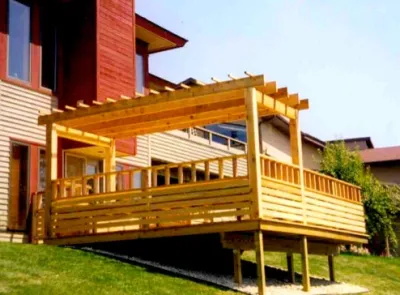 Wooden Deck on a Hill by Ganshert Nursery & Landscapes