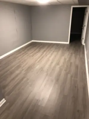 Synthetic Wood Flooring — Home Renovation & Remodeling Services project by Port Building System