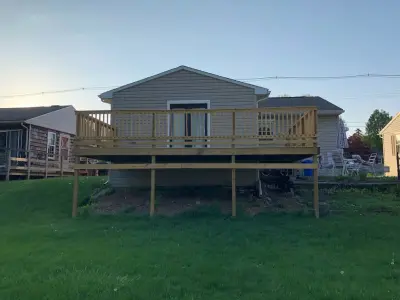 Spacious Custom Deck — Home Renovation & Remodeling Services project by Two Brothers Handyman & Home Improvement Service