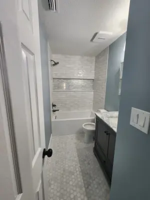 Larris Restroom Renovation — Home Renovation & Remodeling Services project by Premiere Builders & Remodeling