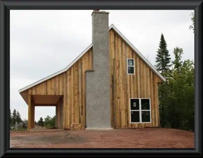 Leisurely River Cottage — Home Renovation & Remodeling Services project by Forefront Garages And More, Inc.