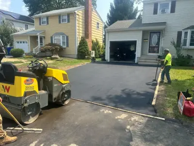 Stratford Asphalt Driveway Replacement — Home Renovation & Remodeling Services project by Omega Development