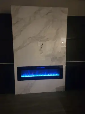Lounge fireplace — Home Renovation & Remodeling Services project by Complete Home Remodel & Renovation Llc.