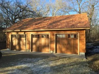 Three-Car Garage Log Cabin with Bonus Room — Home Renovation & Remodeling Services project by Jantz Carpentry