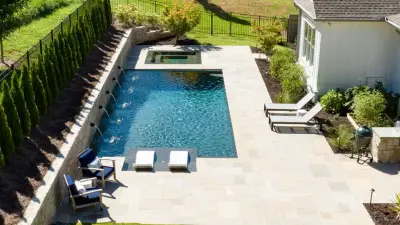 Elegant Outdoor Oasis with Modern Pool and Spa — Home Renovation & Remodeling Services project by Boyce Design + Build