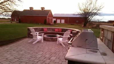 Stone bench by Goetz Landscaping