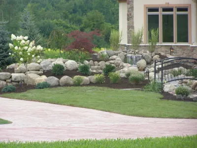 Front Yard Water Fall and Landscape — Landscape Construction project by Gossel Lawn And Landscape