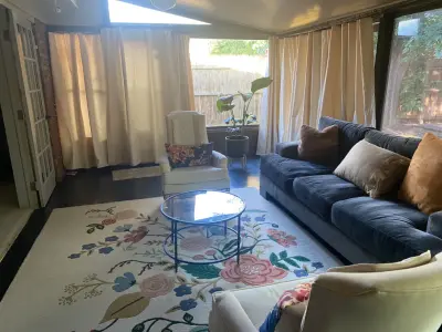 Main bedroom makeover with sunroom enhancement by The Glover Group, LLC