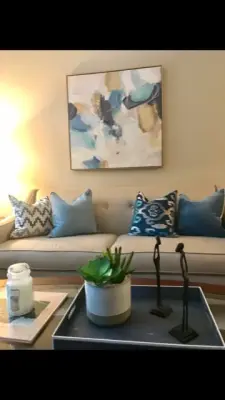 A Revitalization with Art, Cushions, and Accessories by House To Home