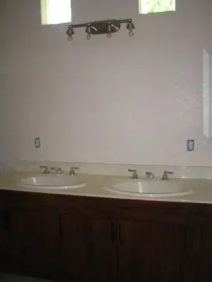 Bathroom Renovations: A Comparison of Before and After by VanderHelm Interior Design