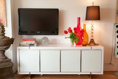 Elevated Apartment Revamp by Wesley-Wayne Interiors, LLC