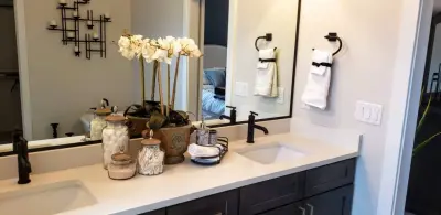 Modern Monochrome Bathroom by Interiors By Design, LLC