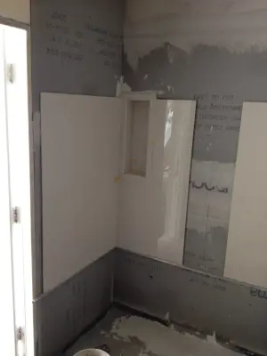 Jupiter, Florida Bathroom Remodel - Using Vertical Lines to Enhance a Compact Area — Interior Design & Decorating project by Southeast Interior Design, Inc.