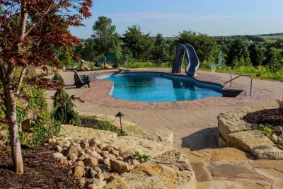 Quiet Swimming Haven With Incredible Outdoor Features and Home Additions — Landscape Construction project by Groundscapes, Inc.