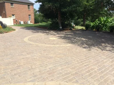 Old World Driveway — Landscape Construction project by Growing Edge Landscape & Design, Inc.