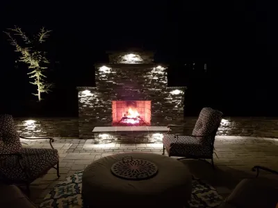 Outdoor Kitchen / Outdoor Fireplace by H2O-Matic Outdoor Creations