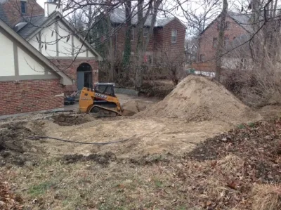 Tie Wall Stone Landscaping Redesign by Hackman Lawn & Landscape