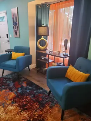 Bohemian Tribe with Ocean Blue Walls — Interior Design & Decorating project by Braxton Designs & Events