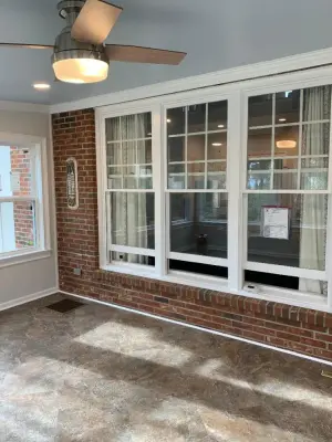SWAIN SCREEN PORCH REMODEL TO SUNROOM - BEFORE AND AFTER IMAGES by Designs By Cheryl Lynn & Associates, LLC