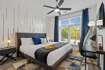 The Azure Jewel: Comprehensive AirBNB Design — Interior Design & Decorating project by Interiors À La Mode, LLC