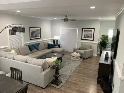 charcoal men's apartment — Interior Design & Decorating project by Danielle Unser