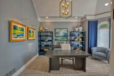 A Blue Home Office with Gold Accents for a Masculine Touch by Lisa Lynn Designs Home Store & Design Studio