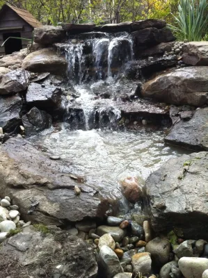 waterfalls — Landscape Construction project by Holly Days Nursery & Landscaping in Ambler