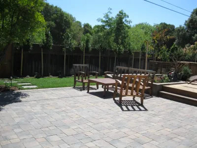 Inviting Garden with Fence, Paved Patio, & Raised Beds — Landscape Construction project by Hortus Design Sustainable Landscapes in Los Altos