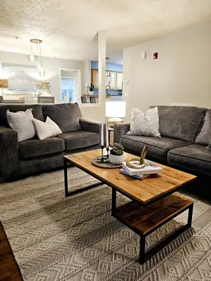 Coastal Bohemian Condo on Spencer Farlow Drive by Porchlight Interiors LLC
