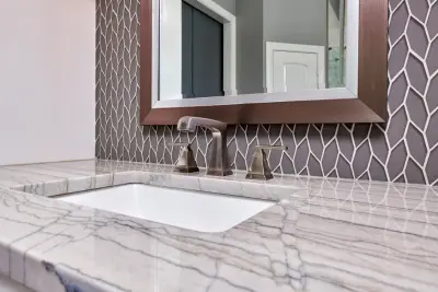 White Bathroom with Wood Flooring — Interior Design & Decorating project by Jana Ward Interiors