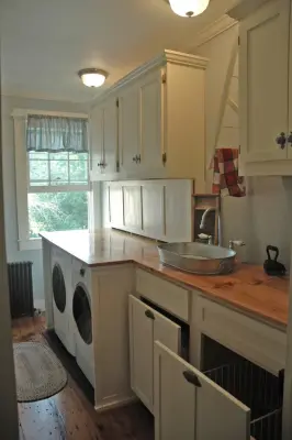 Designing a laundry space in an 18th century home by Butler Restorations LLC