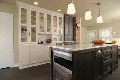 Framed Glass Doors in White by Signature Design & Cabinetry LLC