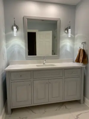 Carrara Bathroom for Guests by Buckeye Cabinet & Supply, Inc.