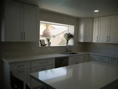 Efficient and Stylish Kitchen Renovation with Full-Length Storage Solutions — Custom Cabinets & Cabinetry project by Alpha Remodelers